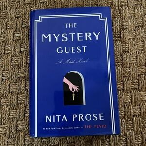 The Mystery Guest Hardcover Book